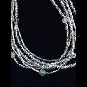Multi strand iridescent clear w blue necklace